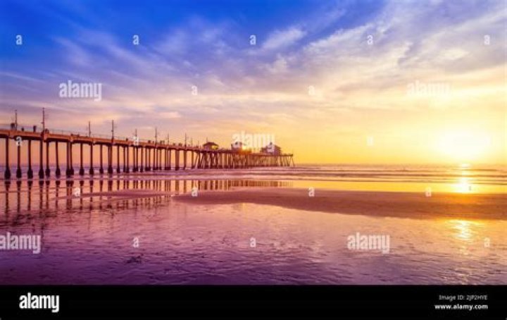 How deep is the water at the end of Huntington Beach Pier?