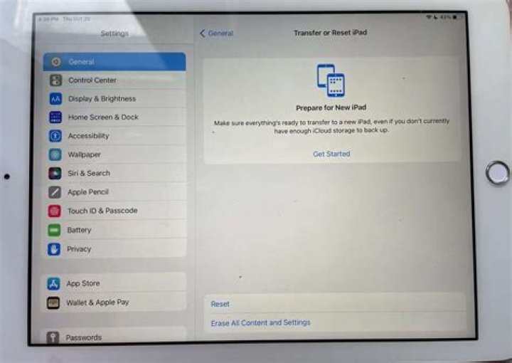 How do you completely reset an iPad?