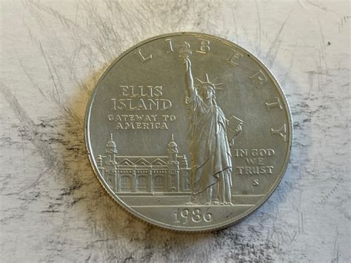 What is the value of a 1986 Ellis Island Silver Dollar?