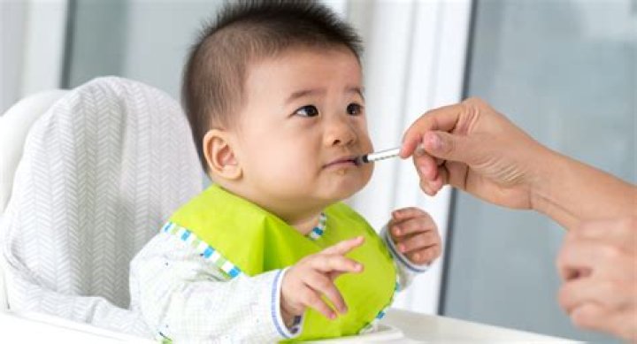 What should I do if my baby throws up antibiotics?