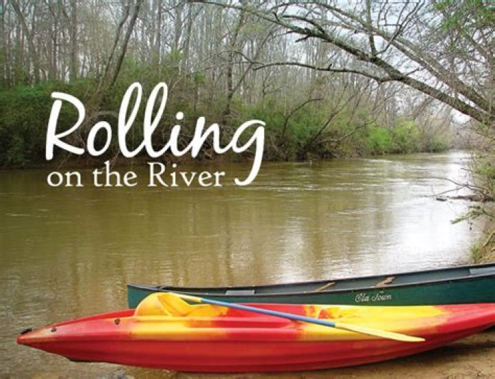 Who originally sang rolling on the river?
